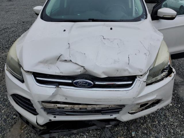 Photo 12 from auction – 2014 FORD ESCAPE TIT with VIN 1FMCU0JX5EUA02643