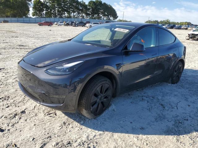 TESLA MODEL Y 2024 with VIN 7SAYGDED8RA307271 - Photo from auction