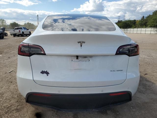 Photo 6 from auction – 2021 TESLA MODEL Y with VIN 5YJYGDEE8MF294636