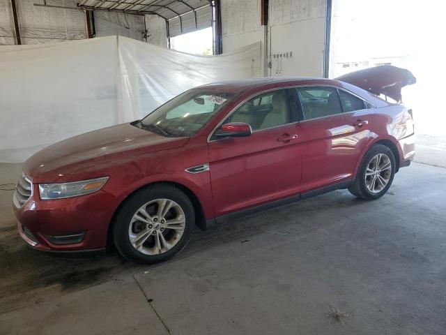 FORD TAURUS SEL 2014 with VIN 1FAHP2H80EG142079 - Photo from auction