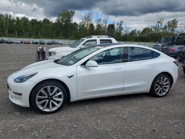 TESLA MODEL 3 2019 with VIN 5YJ3E1EAXKF472569 - Photo from auction