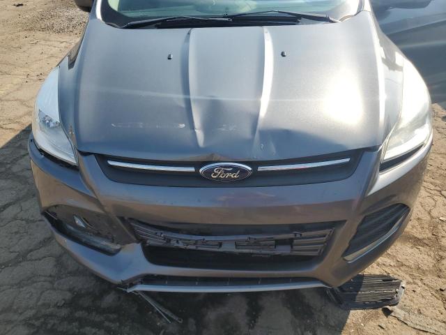 Photo 11 from auction – 2014 FORD ESCAPE SE with VIN 1FMCU9GX3EUD50243
