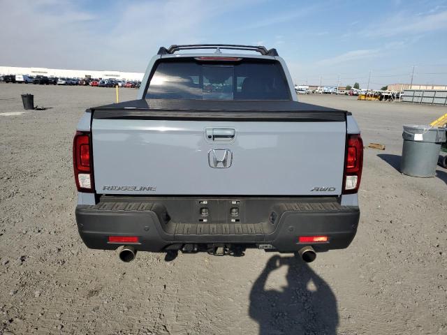 Photo 6 from auction – 2023 HONDA RIDGELINE with VIN 5FPYK3F72PB057175