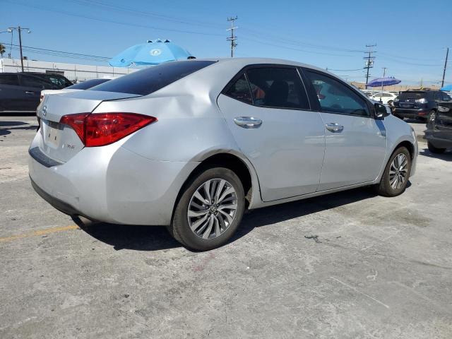 Photo 3 from auction – 2018 TOYOTA COROLLA L with VIN 5YFBURHE8JP759973