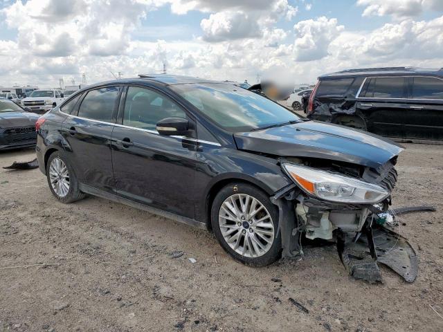 Photo 4 from auction – 2015 FORD FOCUS TITA with VIN 1FADP3J28FL386663