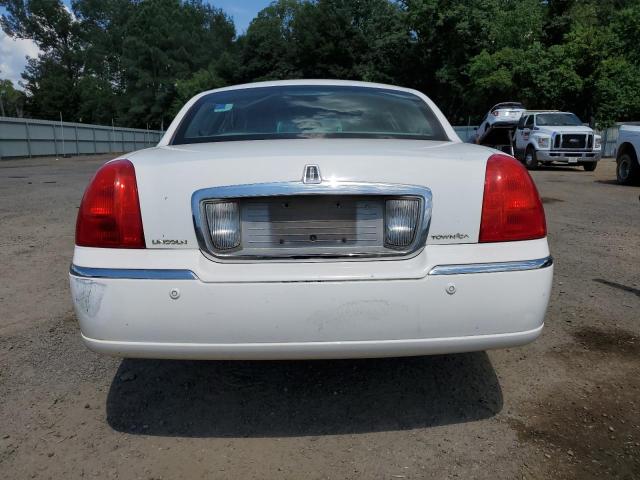 Photo 6 from auction – 2004 LINCOLN TOWN CAR E with VIN 1LNHM81W74Y632781