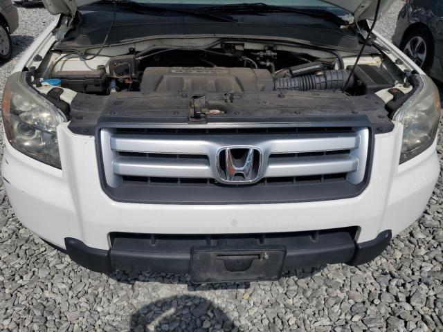 Photo 12 from auction – 2006 HONDA PILOT LX with VIN 2HKYF18176H534578