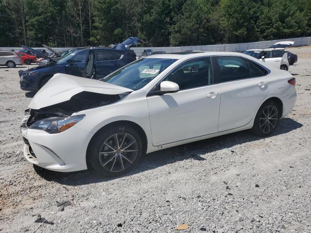 TOYOTA CAMRY LE 2016 with VIN 4T1BF1FK0GU144118 - Photo from auction
