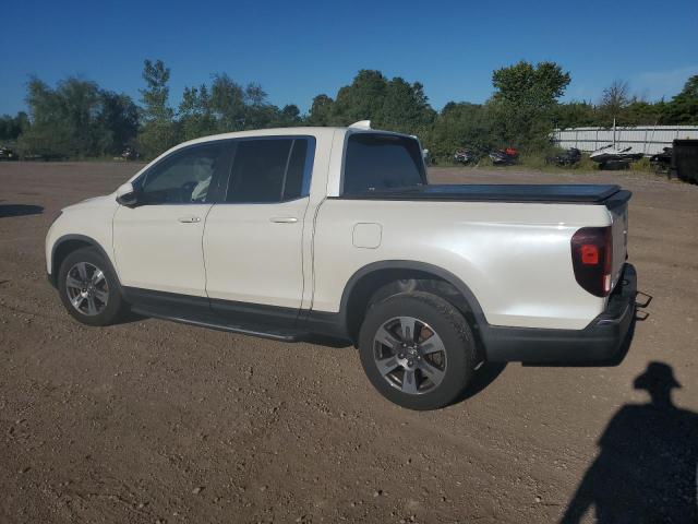 Photo 2 from auction – 2017 HONDA RIDGELINE with VIN 5FPYK3F57HB016699