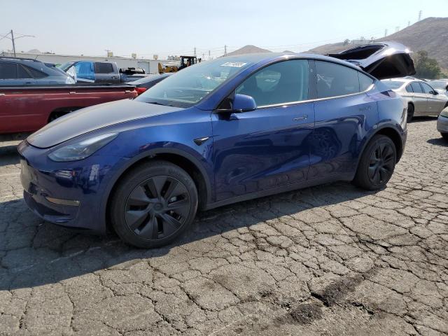 TESLA MODEL Y 2025 with VIN 7SAYGDEE7SF276144 - Photo from auction