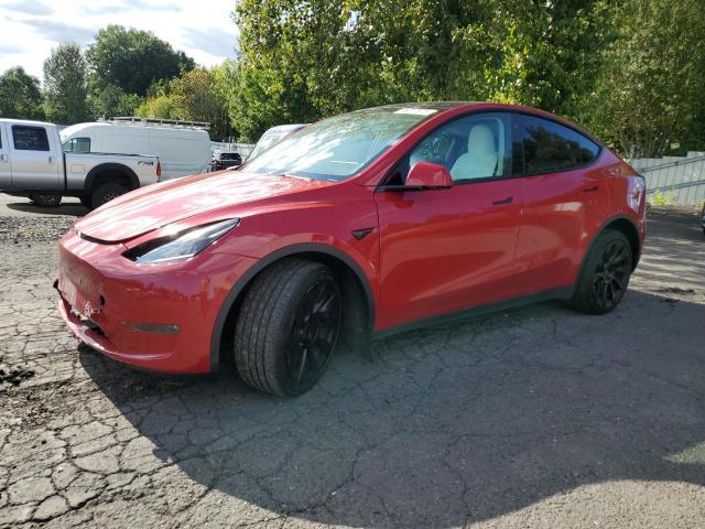 TESLA MODEL Y 2023 with VIN 7SAYGAEE6PF785809 - Photo from auction