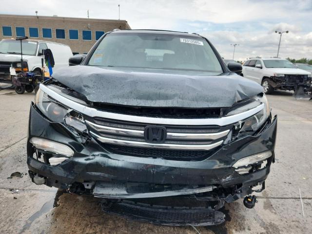Photo 5 from auction – 2016 HONDA PILOT EXL with VIN 5FNYF6H55GB023743