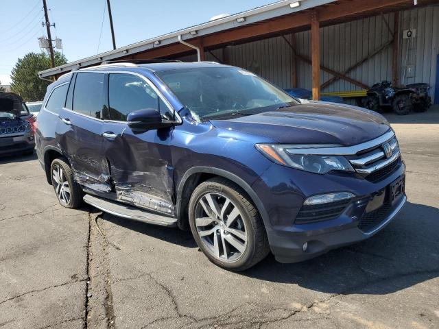 Photo 4 from auction – 2018 HONDA PILOT TOURING with VIN 5FNYF6H94JB057389