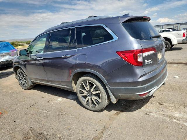 Photo 2 from auction – 2021 HONDA PILOT ELIT with VIN 5FNYF6H06MB009561