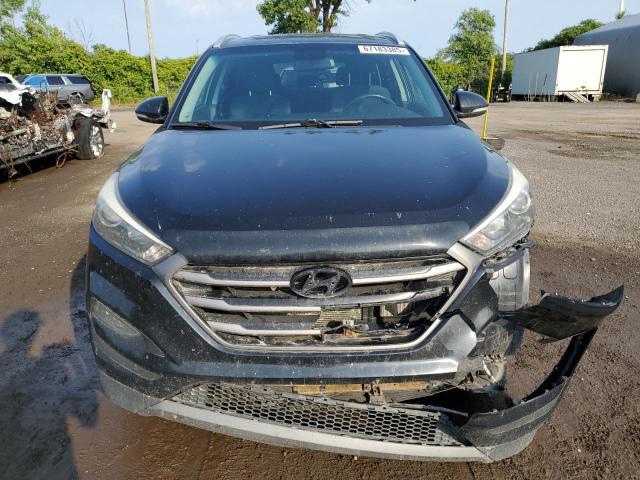 Photo 5 from auction – 2016 HYUNDAI TUCSON LIM with VIN KM8J3CA20GU219049