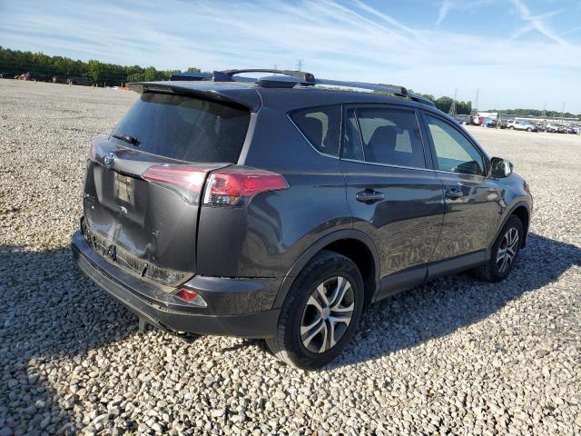 Photo 3 from auction – 2017 TOYOTA RAV4 LE with VIN JTMZFREV6HJ141272