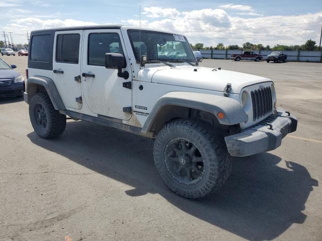Photo 4 from auction – 2011 JEEP WRANGLER U with VIN 1J4BA3H10BL628821