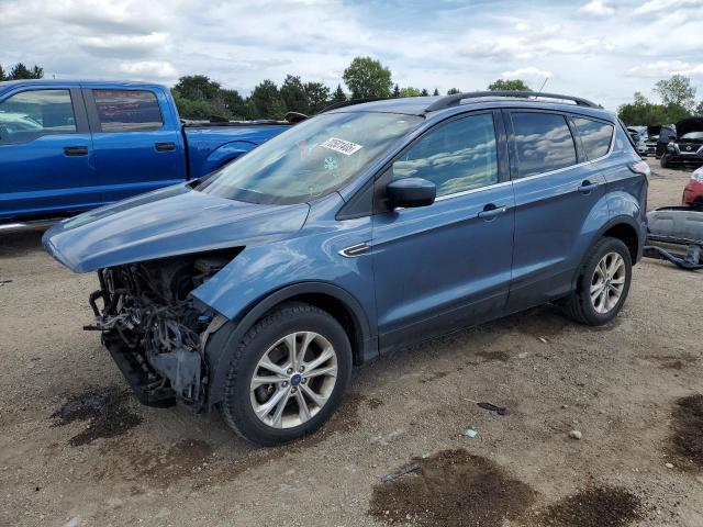FORD ESCAPE SE 2018 with VIN 1FMCU9GD0JUC89966 - Photo from auction