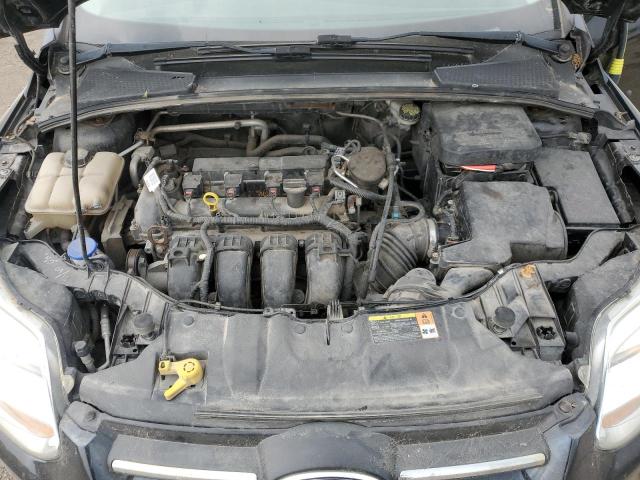 Photo 11 from auction – 2014 FORD FOCUS S with VIN 1FADP3E21EL261724