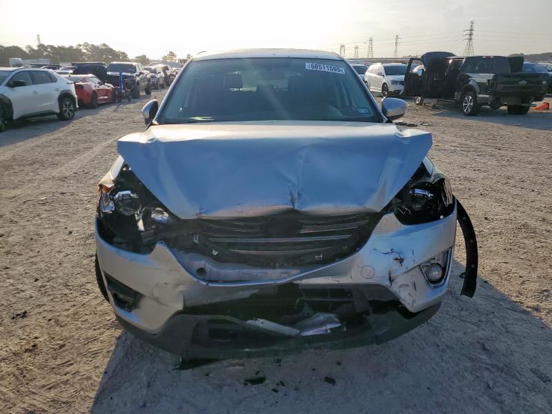Photo 5 from auction – 2016 MAZDA CX-5 GT with VIN JM3KE2DY4G0682386