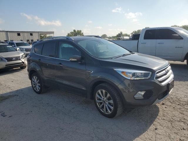 Photo 4 from auction – 2018 FORD ESCAPE TIT with VIN 1FMCU9J95JUD50443