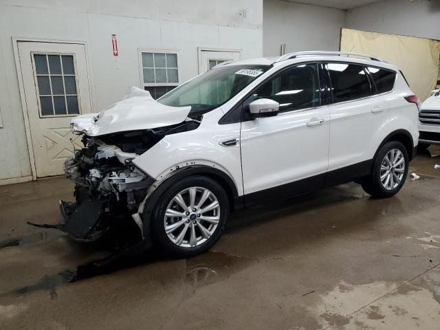 FORD ESCAPE TIT 2017 with VIN 1FMCU9JD0HUB52044 - Photo from auction