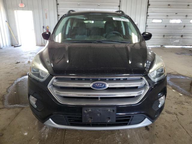 Photo 5 from auction – 2017 FORD ESCAPE SE with VIN 1FMCU9GD0HUA58575