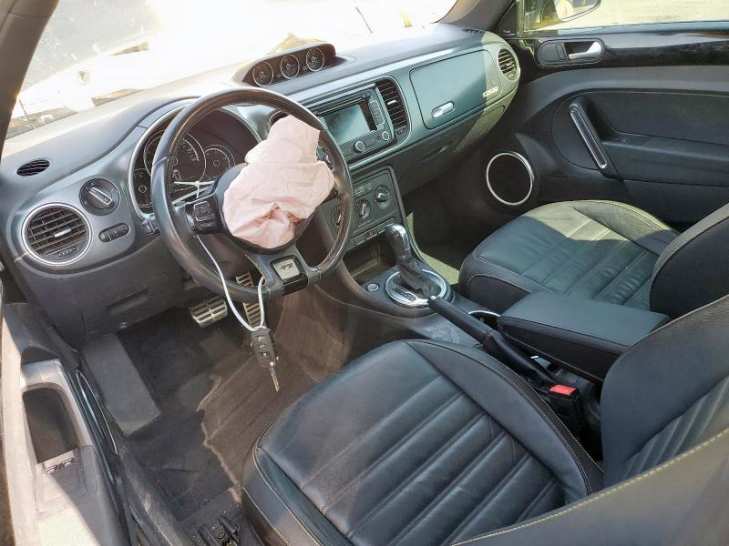 Photo 8 from auction – 2014 VOLKSWAGEN BEETLE TUR with VIN 3VWVS7AT2EM619220
