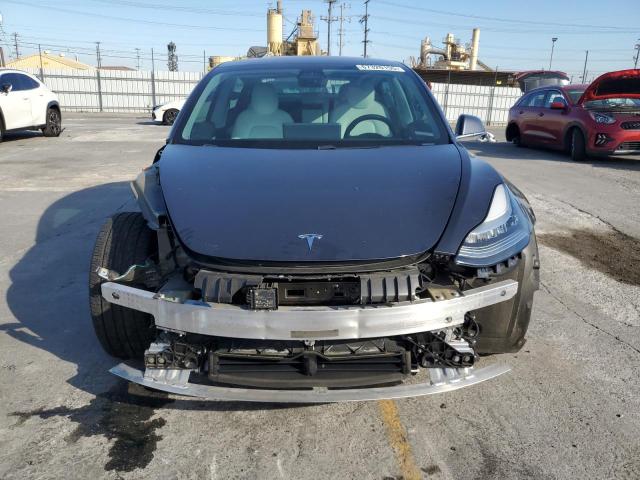 Снимка 5 от търг – 2019 TESLA MODEL 3 с VIN 5YJ3E1EA7KF301746