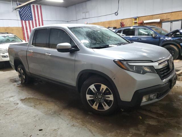 Photo 4 from auction – 2018 HONDA RIDGELINE with VIN 5FPYK3F77JB012899