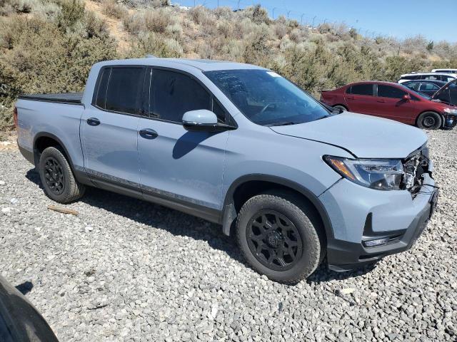 Photo 4 from auction – 2023 HONDA RIDGELINE with VIN 5FPYK3F77PB012491
