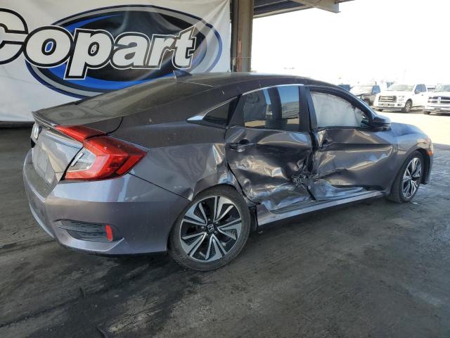 Photo 3 from auction – 2017 HONDA CIVIC EX with VIN 19XFC1F37HE204810