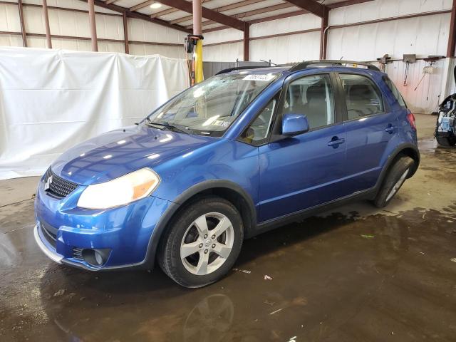 SUZUKI SX4 2012 with VIN JS2YB5A33C6303705 - Photo from auction