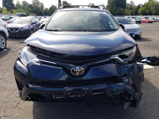 Photo 5 from auction – 2018 TOYOTA RAV4 LE with VIN JTMBFREV7JJ189032