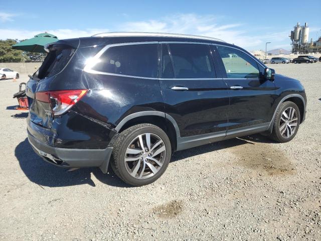 Photo 3 from auction – 2017 HONDA PILOT TOURING with VIN 5FNYF6H98HB097288