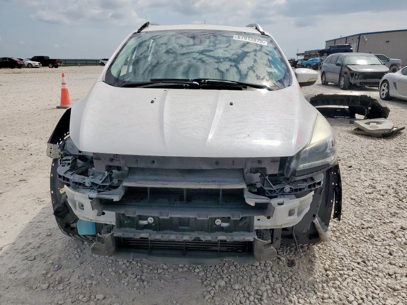Photo 5 from auction – 2016 FORD ESCAPE TIT with VIN 1FMCU0J98GUC57842