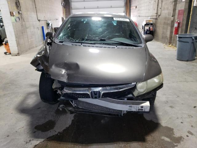 Photo 5 from auction – 2011 HONDA CIVIC LX with VIN 19XFA1F5XBE048695