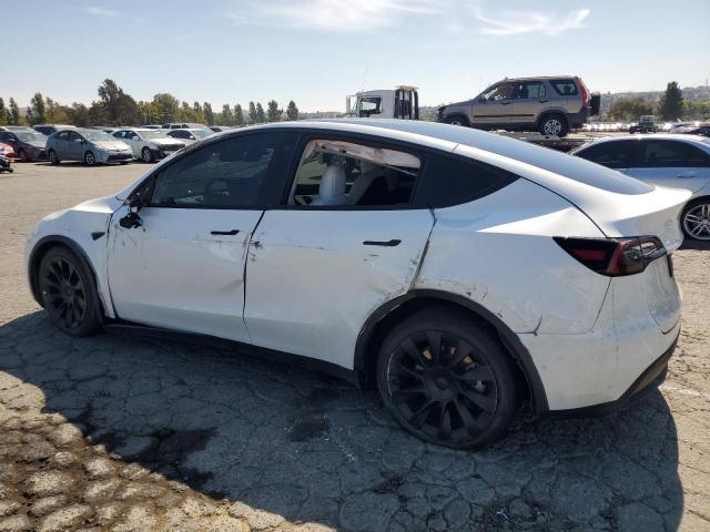 Photo 2 from auction – 2022 TESLA MODEL Y with VIN 7SAYGAEE7NF429785