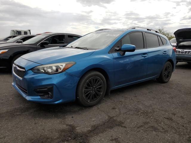 SUBARU IMPREZA PREMIUM PLUS 2018 with VIN 4S3GTAD6XJ3733585 - Photo from auction