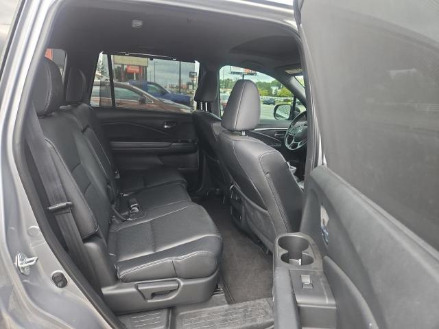 Photo 6 from auction – 2021 HONDA PASSPORT E with VIN 5FNYF8H5XMB026158