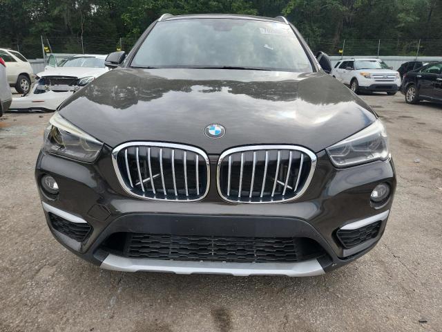 Photo 5 from auction – 2016 BMW X1 XDRIVE2 with VIN WBXHT3C36G5E48005