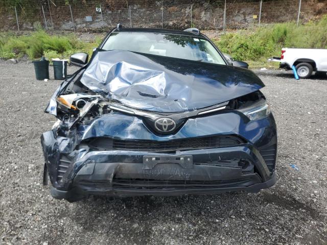 Photo 5 from auction – 2018 TOYOTA RAV4 LE with VIN JTMBFREV4JJ244648
