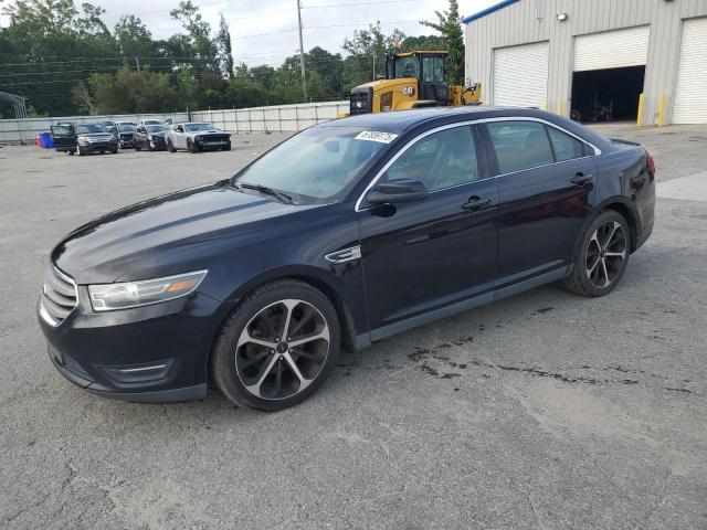 FORD TAURUS SEL 2016 with VIN 1FAHP2E8XGG121523 - Photo from auction