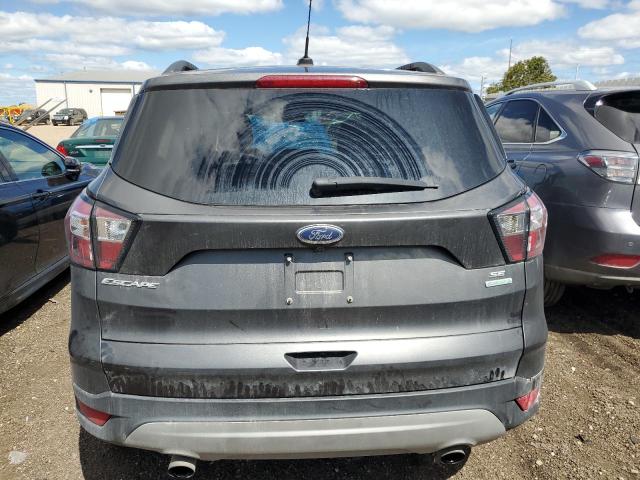 Photo 6 from auction – 2018 FORD ESCAPE SE with VIN 1FMCU0GD9JUA82908