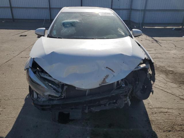 Photo 5 from auction – 2014 TOYOTA COROLLA EC with VIN 5YFBPRHE0EP113582