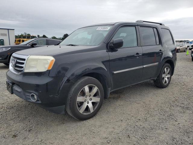 HONDA PILOT TOUR 2015 with VIN 5FNYF3H92FB016393 - Photo from auction
