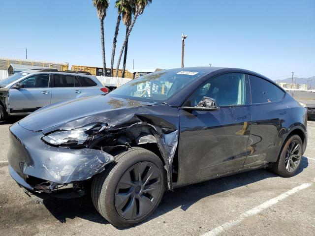 TESLA MODEL Y 2024 with VIN 7SAYGDED4RF162023 - Photo from auction
