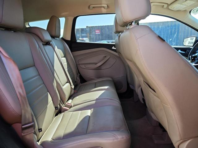 Photo 10 from auction – 2016 FORD ESCAPE TIT with VIN 1FMCU9J95GUB32575