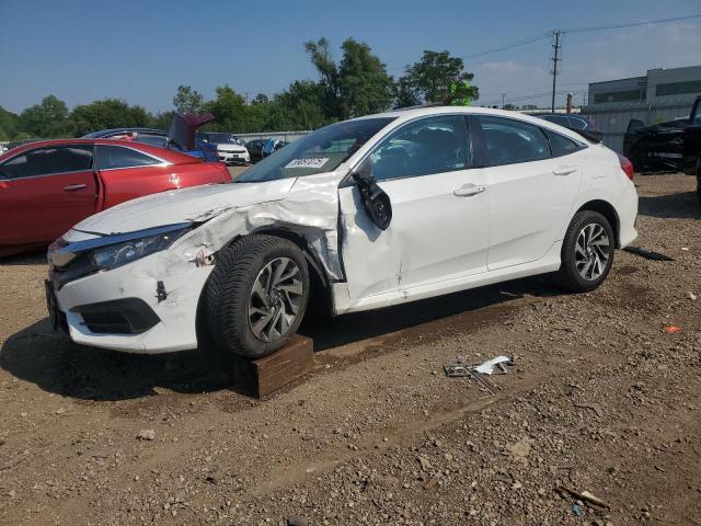 HONDA CIVIC EX 2018 with VIN 19XFC2F70JE038645 - Photo from auction