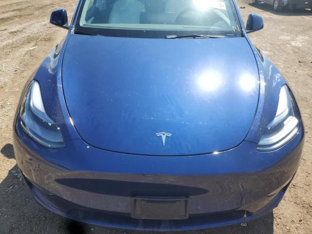 Photo 11 from auction – 2023 TESLA MODEL Y with VIN 7SAYGDEE5PF875292